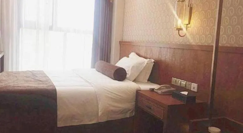 Bed in James Joyce Coffetel Chengdu Century City Convention and Exhibition Center