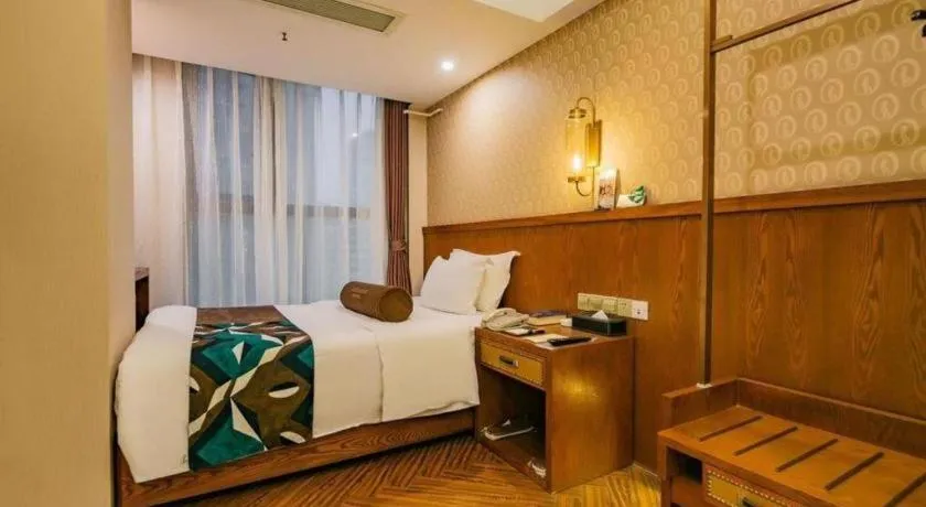 Bed in James Joyce Coffetel Chengdu Century City Convention and Exhibition Center