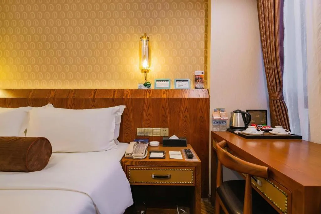 Bed in James Joyce Coffetel Chengdu Century City Convention and Exhibition Center