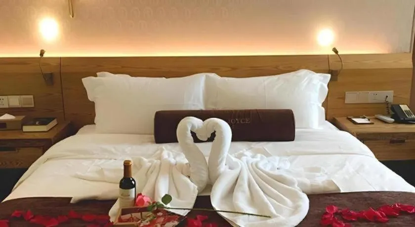 Bed in James Joyce Coffetel Chengdu Century City Convention and Exhibition Center