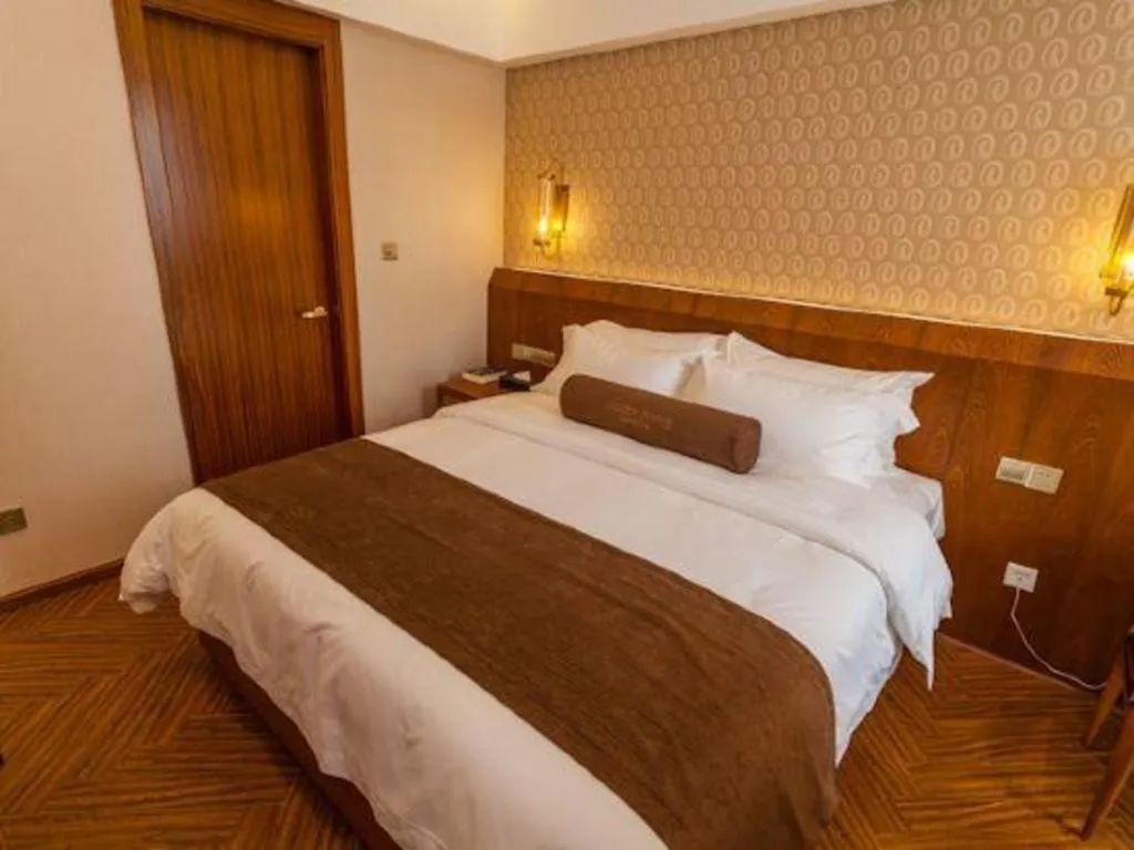 Bed in James Joyce Coffetel Chengdu Century City Convention and Exhibition Center