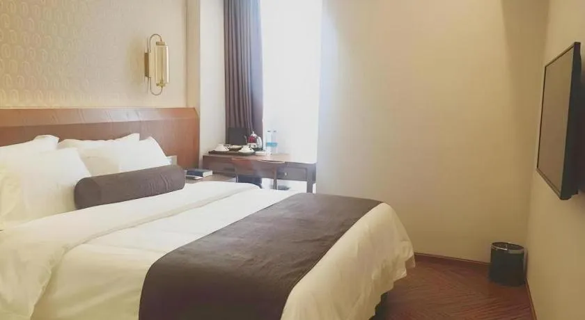 Bed in James Joyce Coffetel Chengdu Century City Convention and Exhibition Center