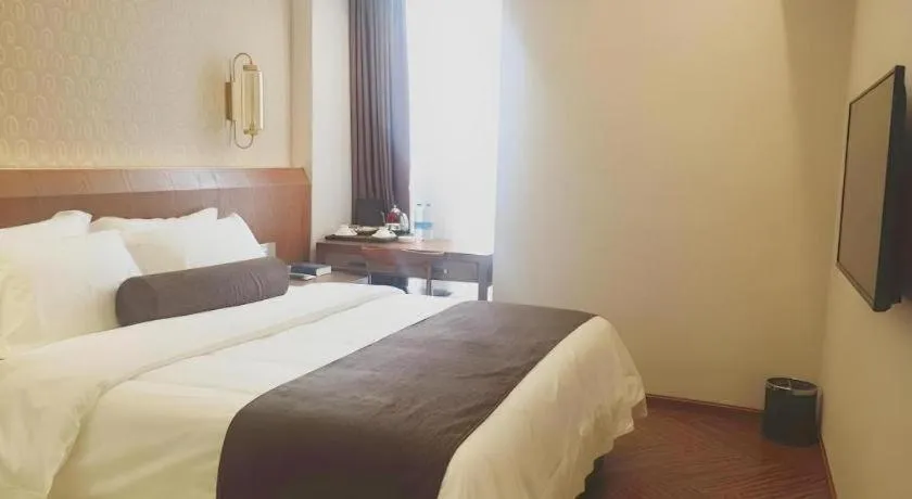 Bed in James Joyce Coffetel Chengdu Century City Convention and Exhibition Center