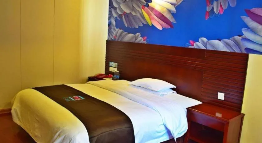 Bed in Hotel Pai Hezhou Lingfeng Plaza