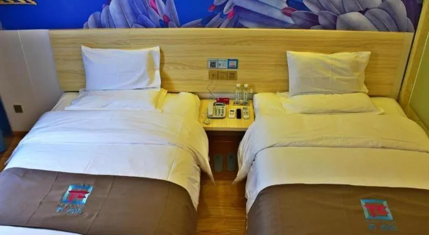 Bed in Hotel Pai Hezhou Lingfeng Plaza