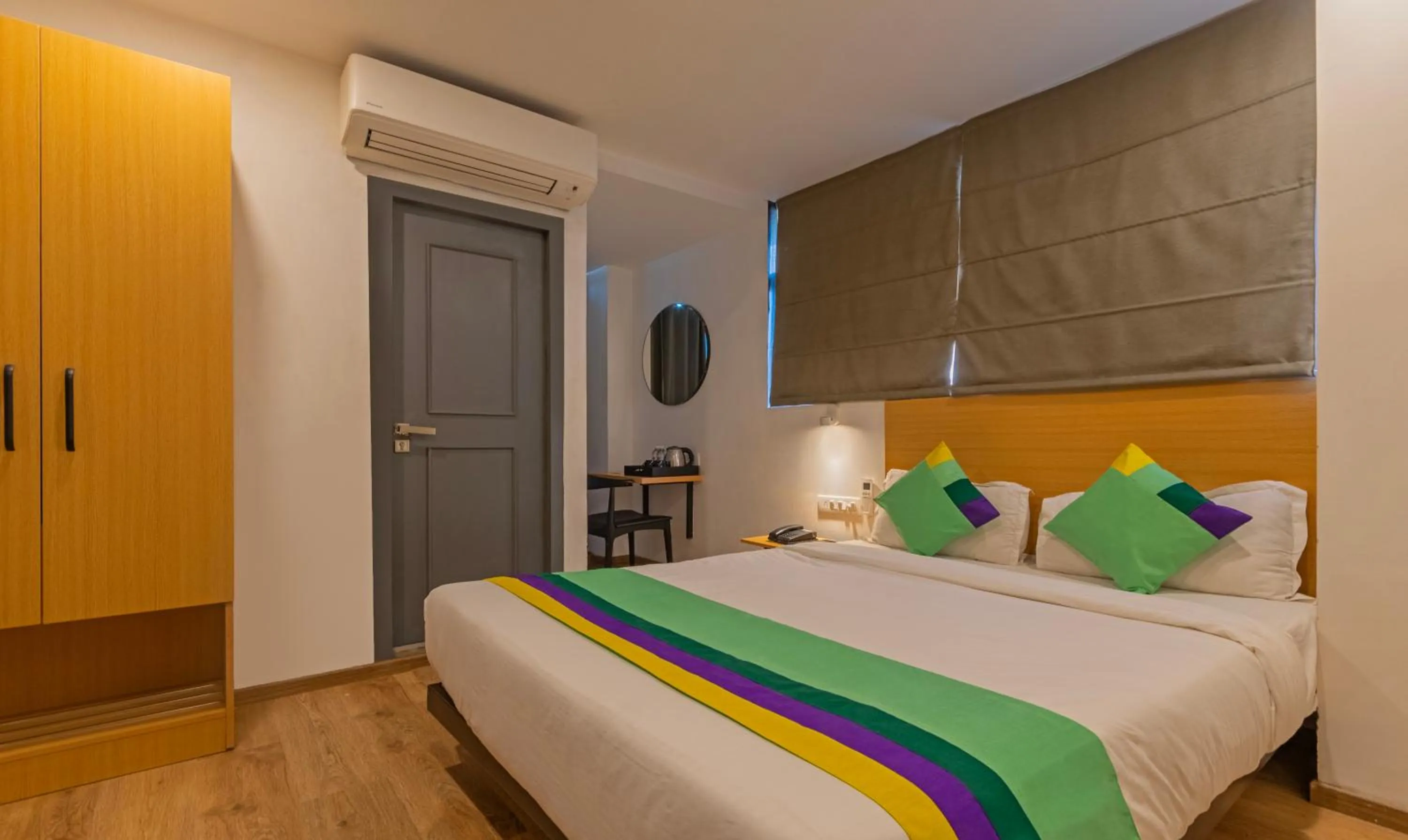 Bedroom, Bed in Treebo The Square