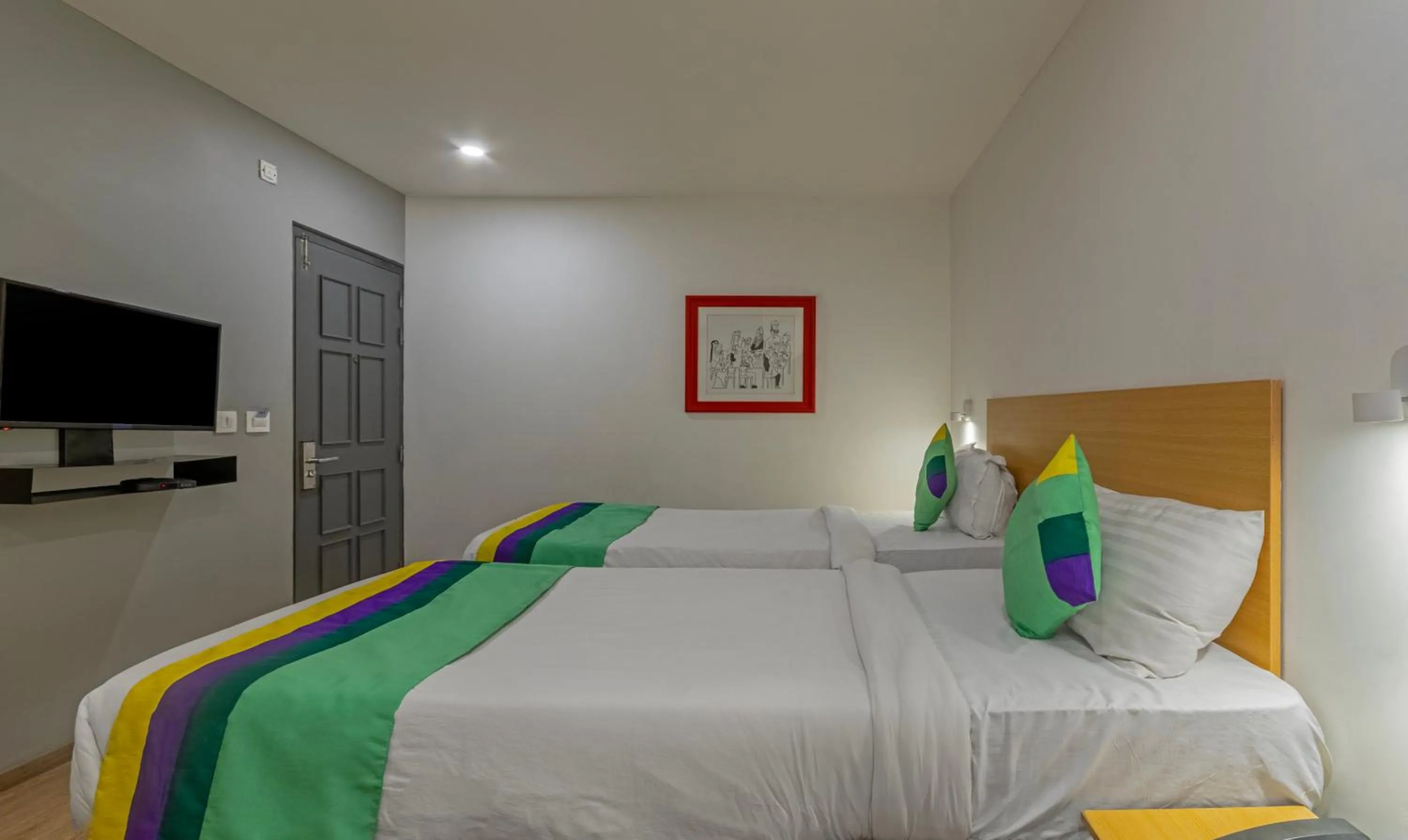 Bedroom, Bed in Treebo The Square