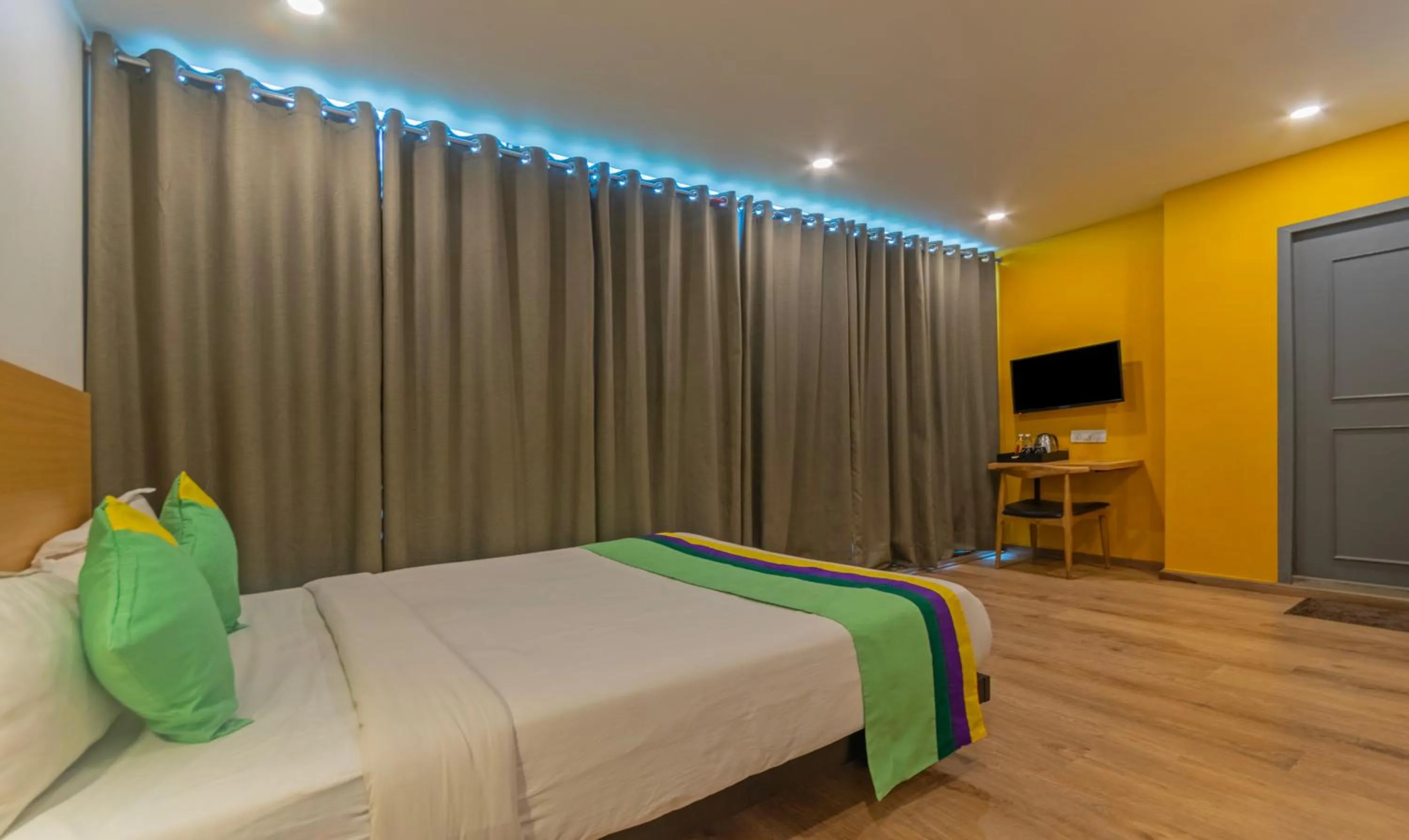 Bedroom, Bed in Treebo The Square