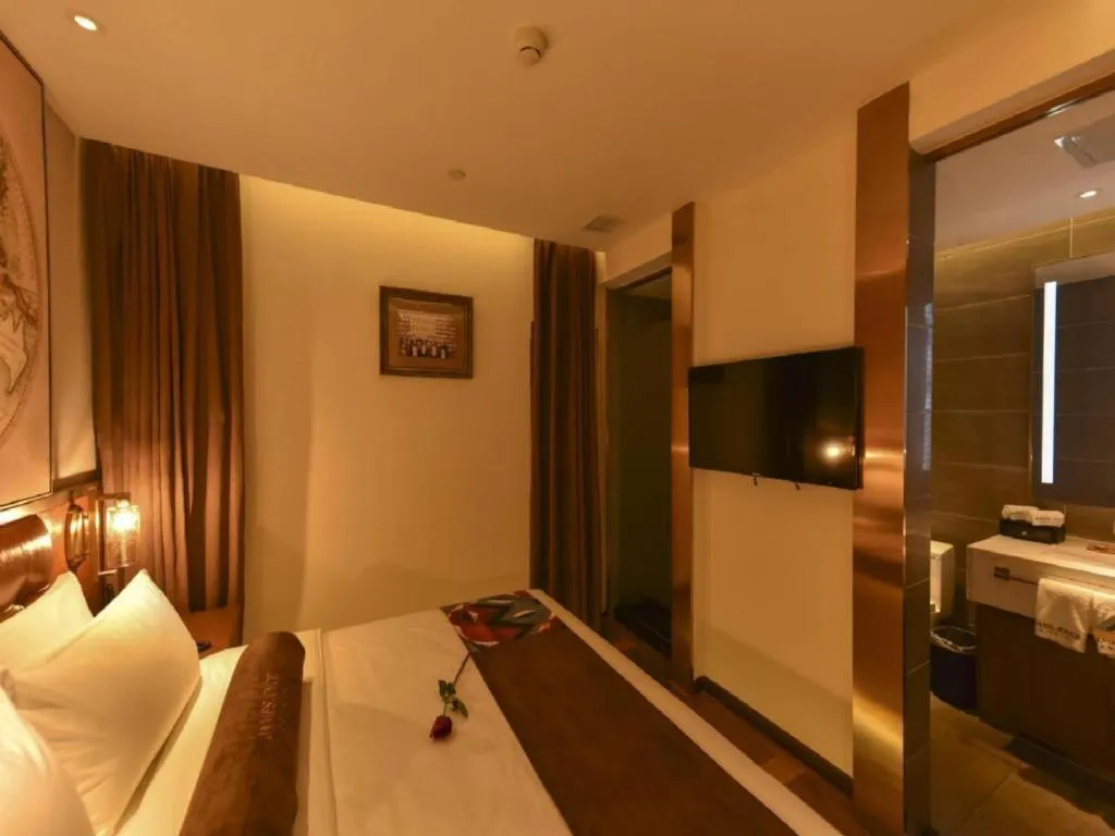 Bed in James Joyce Coffetel·Beijing Yizhuang Development Zone Dazu Square Tongji Road