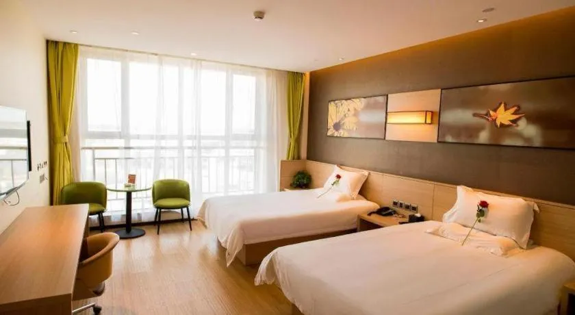 Bed in IU Hotel Zhangye High-Speed Railway Station