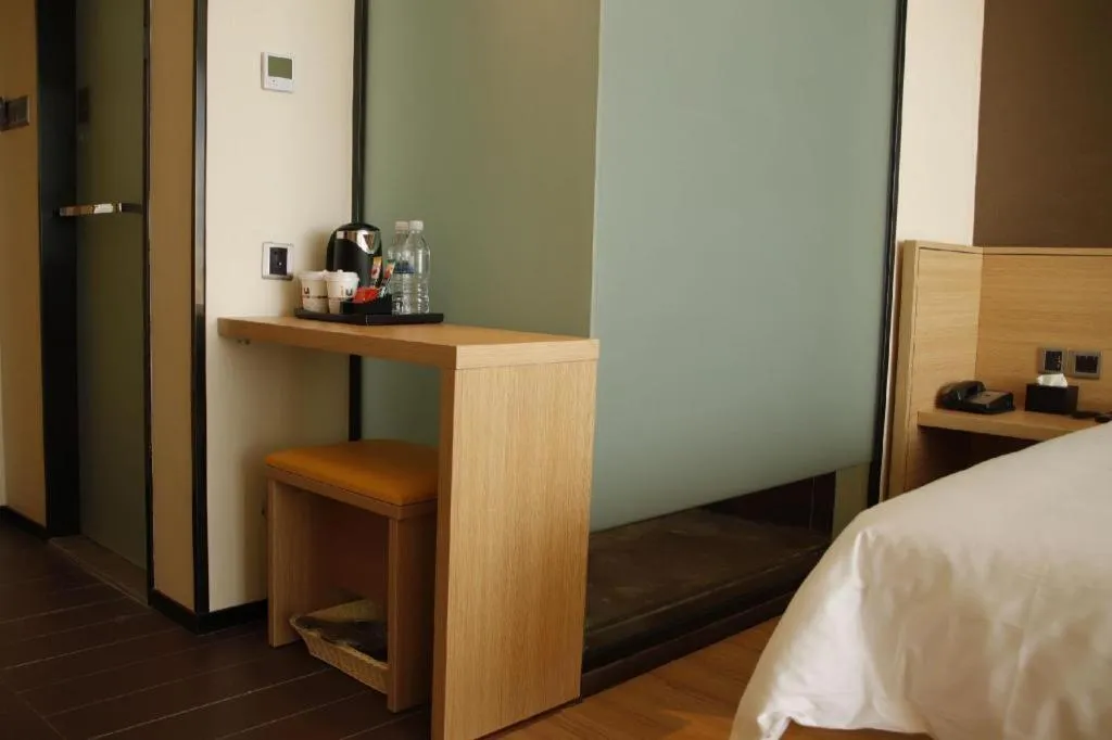 Bed in IU Hotel Zhangye High-Speed Railway Station