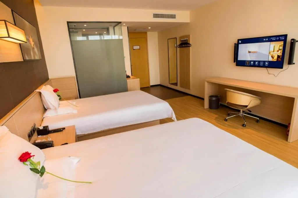 Bed in IU Hotel Zhangye High-Speed Railway Station