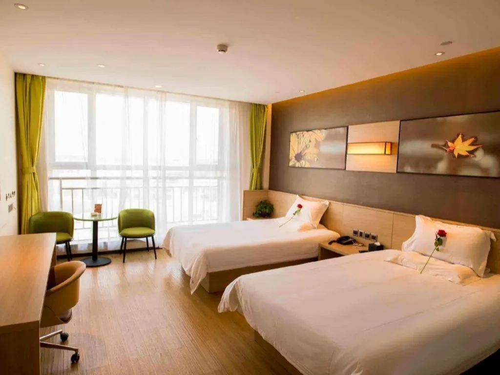 Bed in IU Hotel Zhangye High-Speed Railway Station