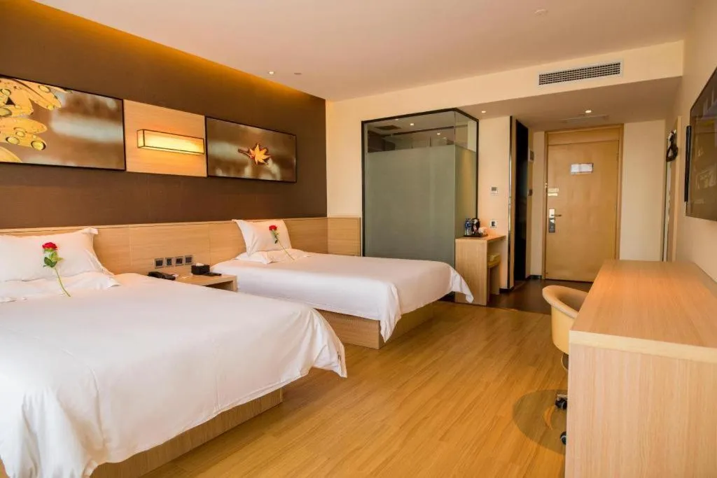 Bed in IU Hotel Zhangye High-Speed Railway Station