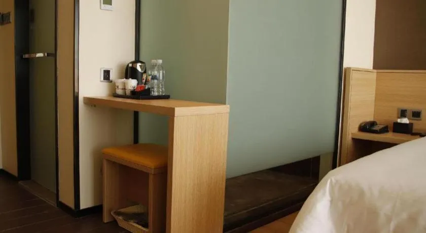 Bed in IU Hotel Zhangye High-Speed Railway Station