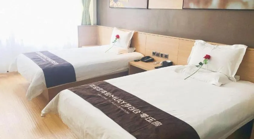 Bed in IU Hotel Zhangye High-Speed Railway Station
