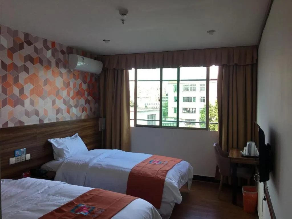 Bed in PAI Hotel Guangzhou Baiyun International Airport Zhongluotan Zhuliao Metro Station
