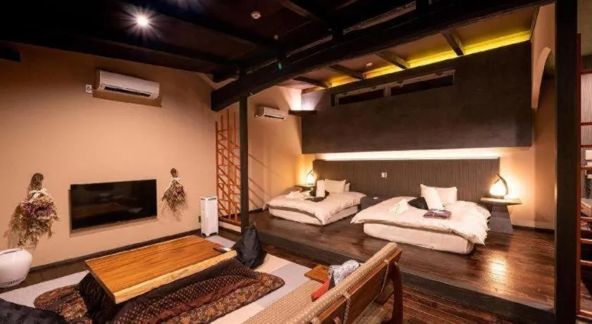 Bed in Yufuin Luxury Villa -zakuro-