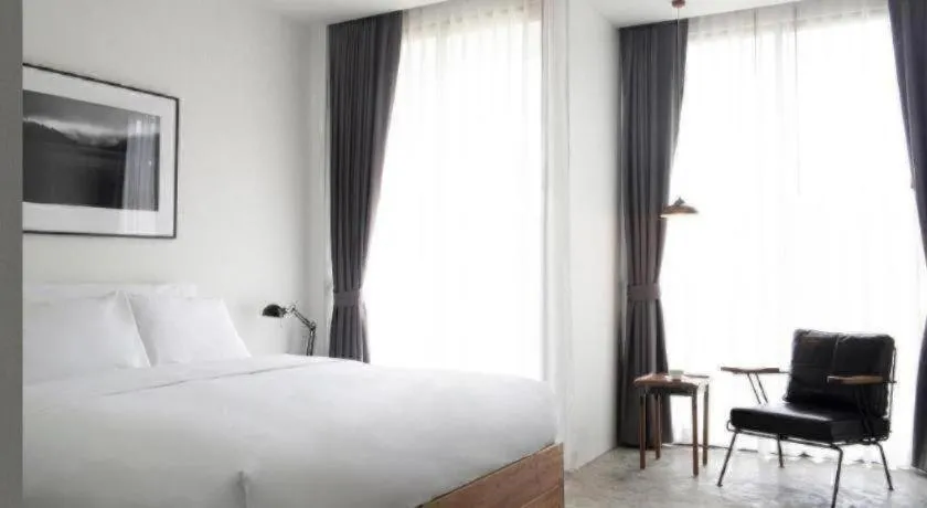 Bed in Rangsiya Boutique Hotel