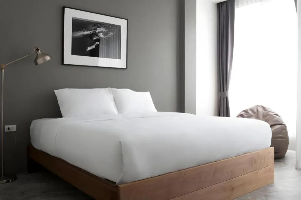 Bed in Rangsiya Boutique Hotel