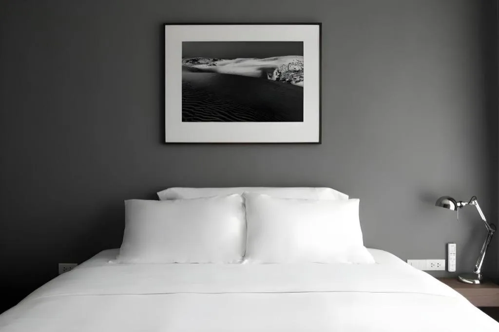 Bed in Rangsiya Boutique Hotel