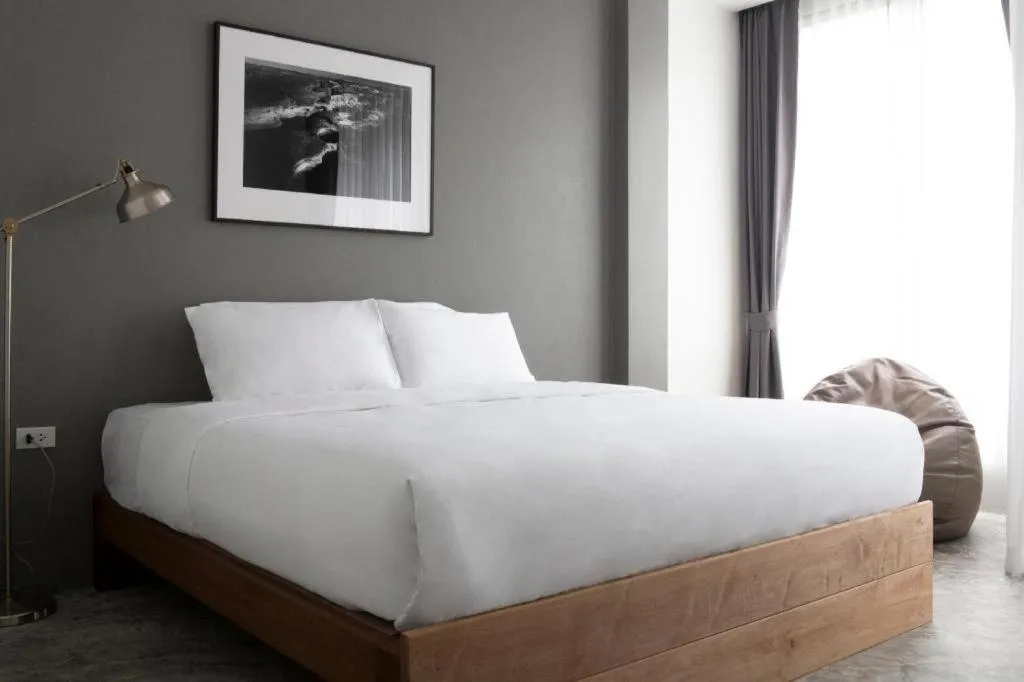 Bed in Rangsiya Boutique Hotel