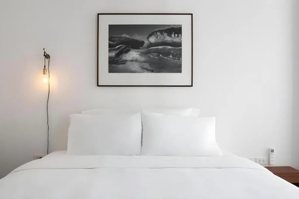 Bed in Rangsiya Boutique Hotel