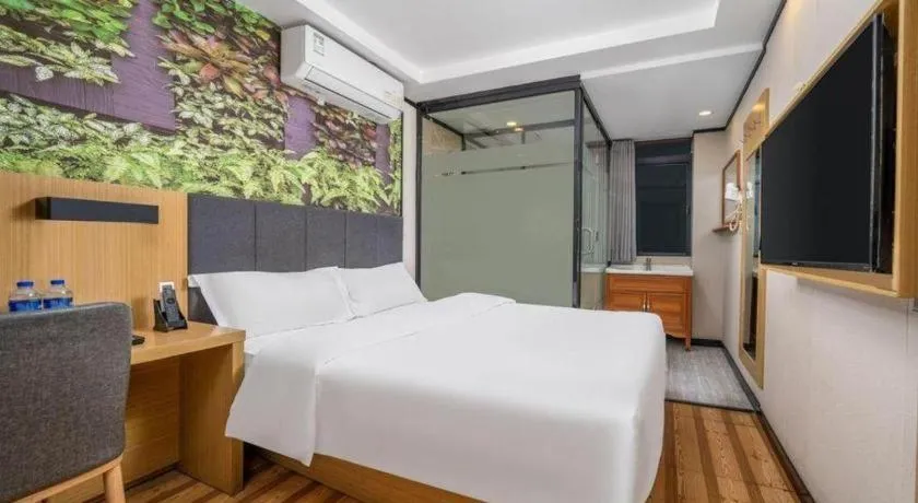 Bed in Yimi Hotel Guangzhou Sport College Branch