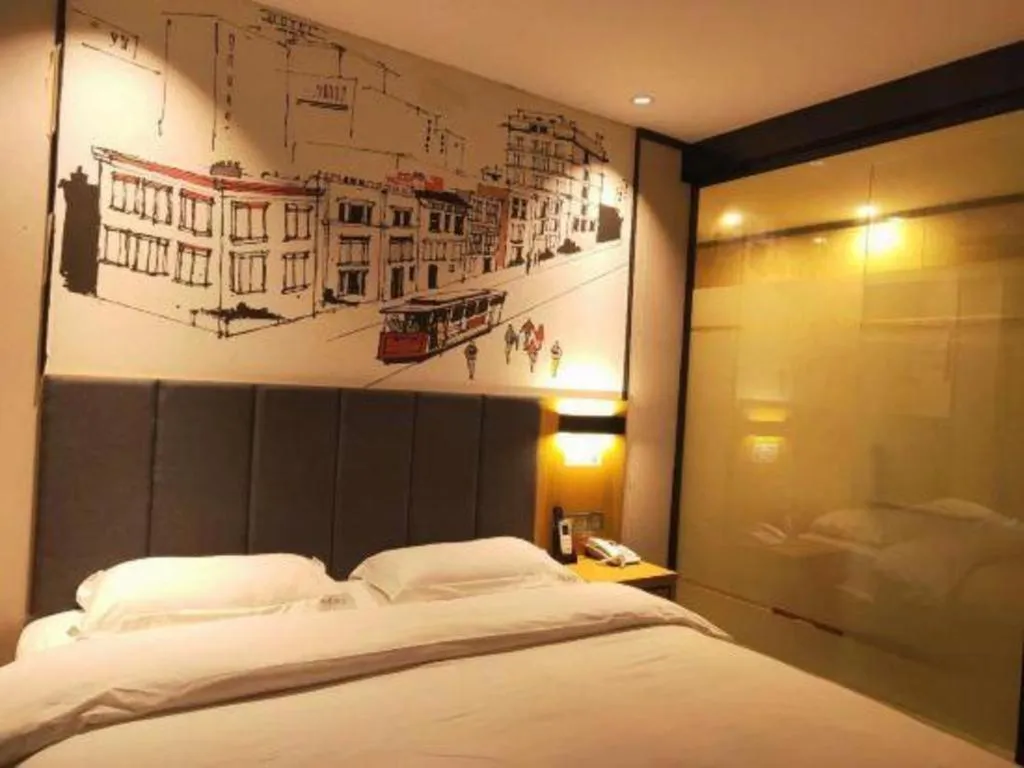 Bed in Yimi Hotel Guangzhou Sport College Branch