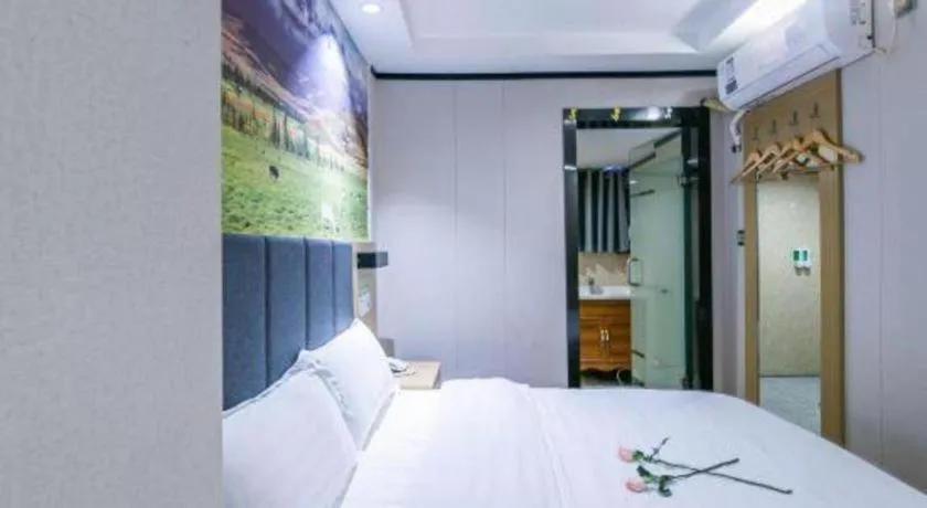 Bed in Yimi Hotel Guangzhou Sport College Branch