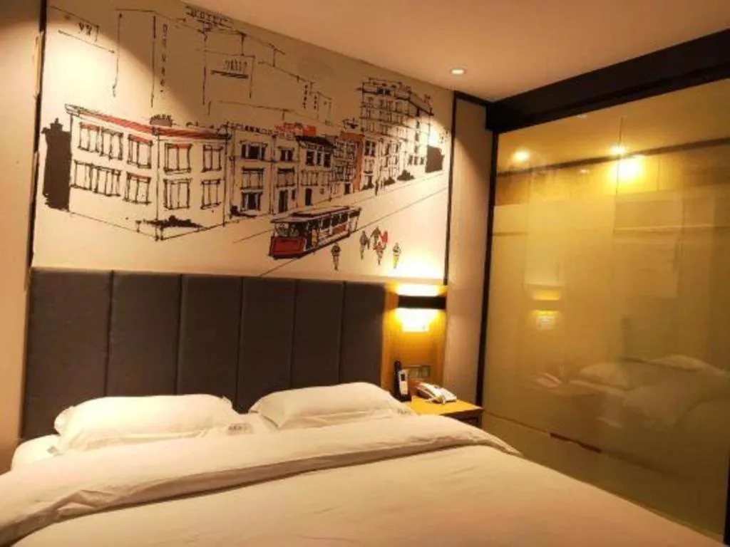 Bed in Yimi Hotel Guangzhou Sport College Branch