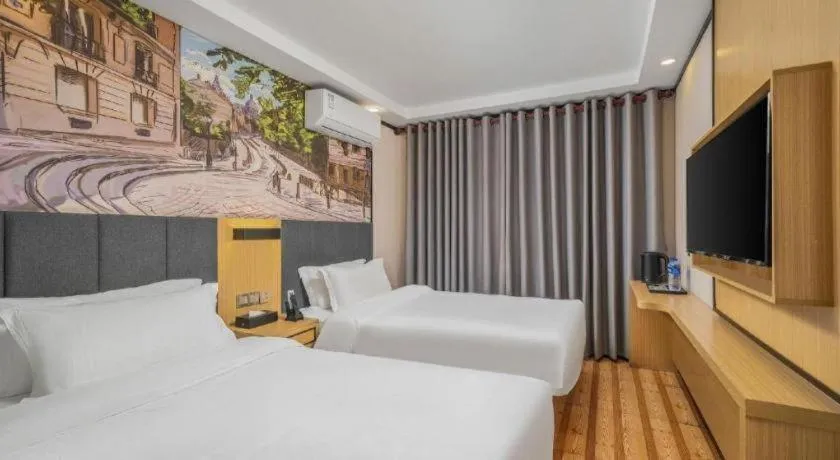 Bed in Yimi Hotel Guangzhou Sport College Branch