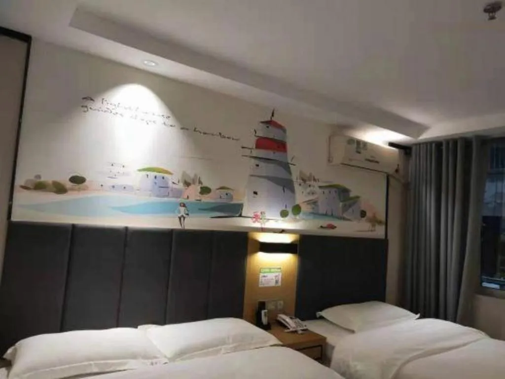Bed in Yimi Hotel Guangzhou Sport College Branch
