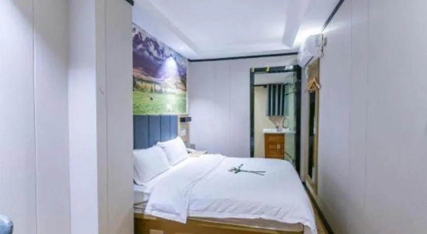 Bed in Yimi Hotel Guangzhou Sport College Branch