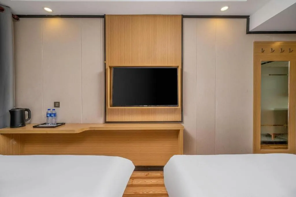 Bed in Yimi Hotel Guangzhou Sport College Branch