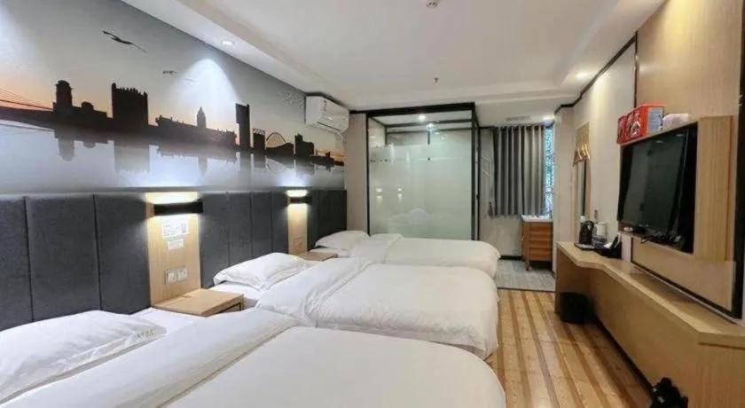 Bed in Yimi Hotel Guangzhou Sport College Branch
