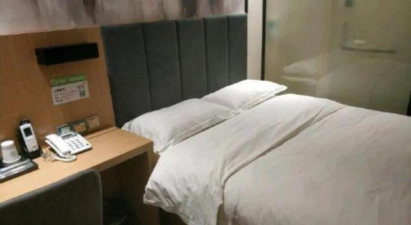 Bed in Yimi Hotel Guangzhou Sport College Branch