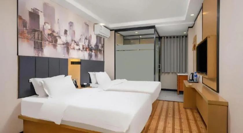 Bed in Yimi Hotel Guangzhou Sport College Branch