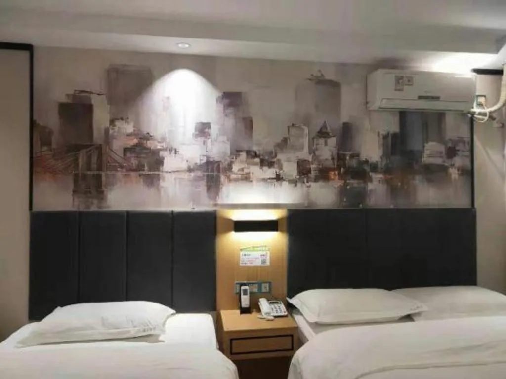 Bed in Yimi Hotel Guangzhou Sport College Branch