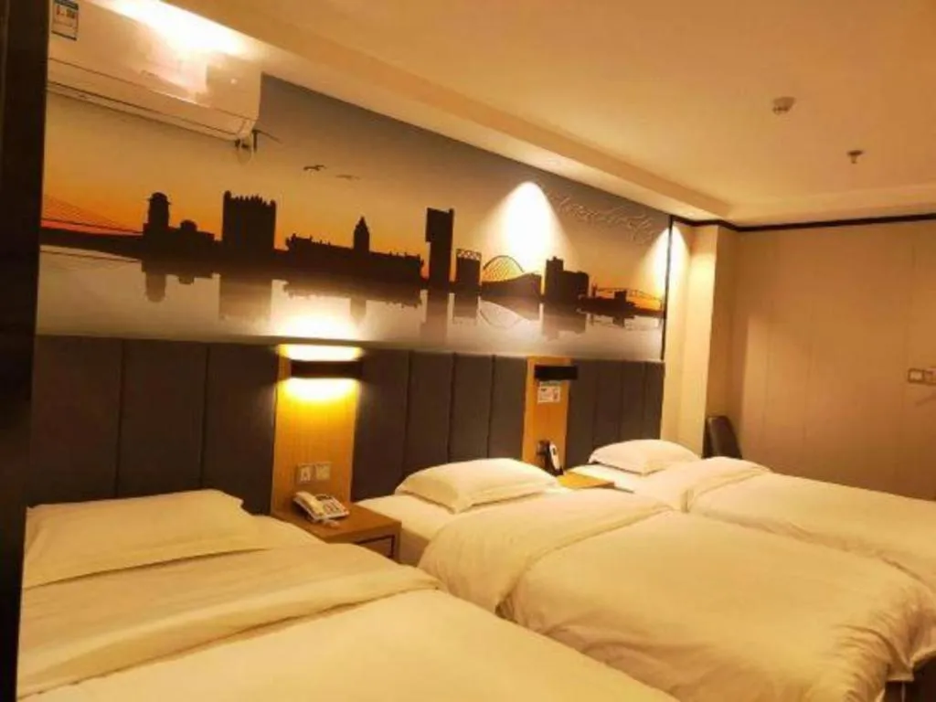 Bed in Yimi Hotel Guangzhou Sport College Branch