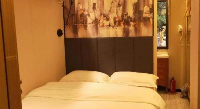 Bed in Yimi Hotel Guangzhou Sport College Branch