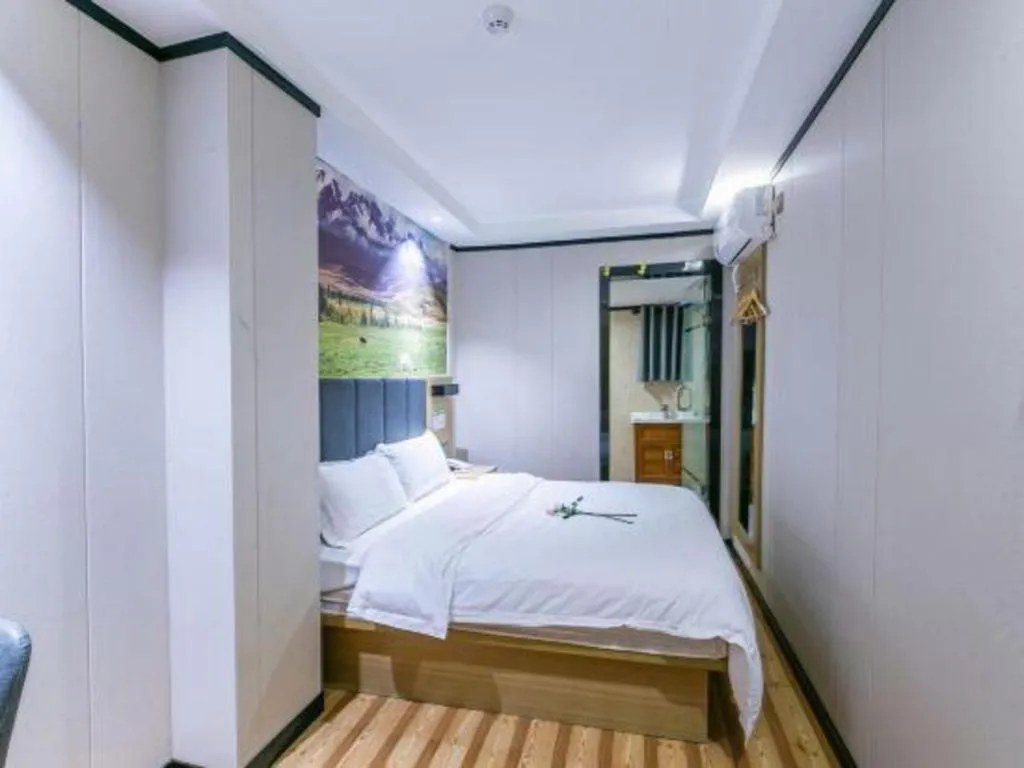 Bed in Yimi Hotel Guangzhou Sport College Branch