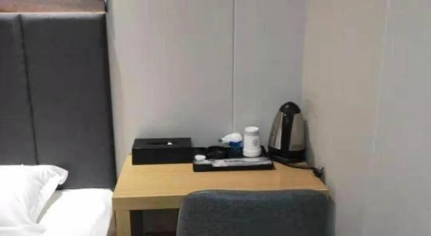 Bed in Yimi Hotel Guangzhou Sport College Branch