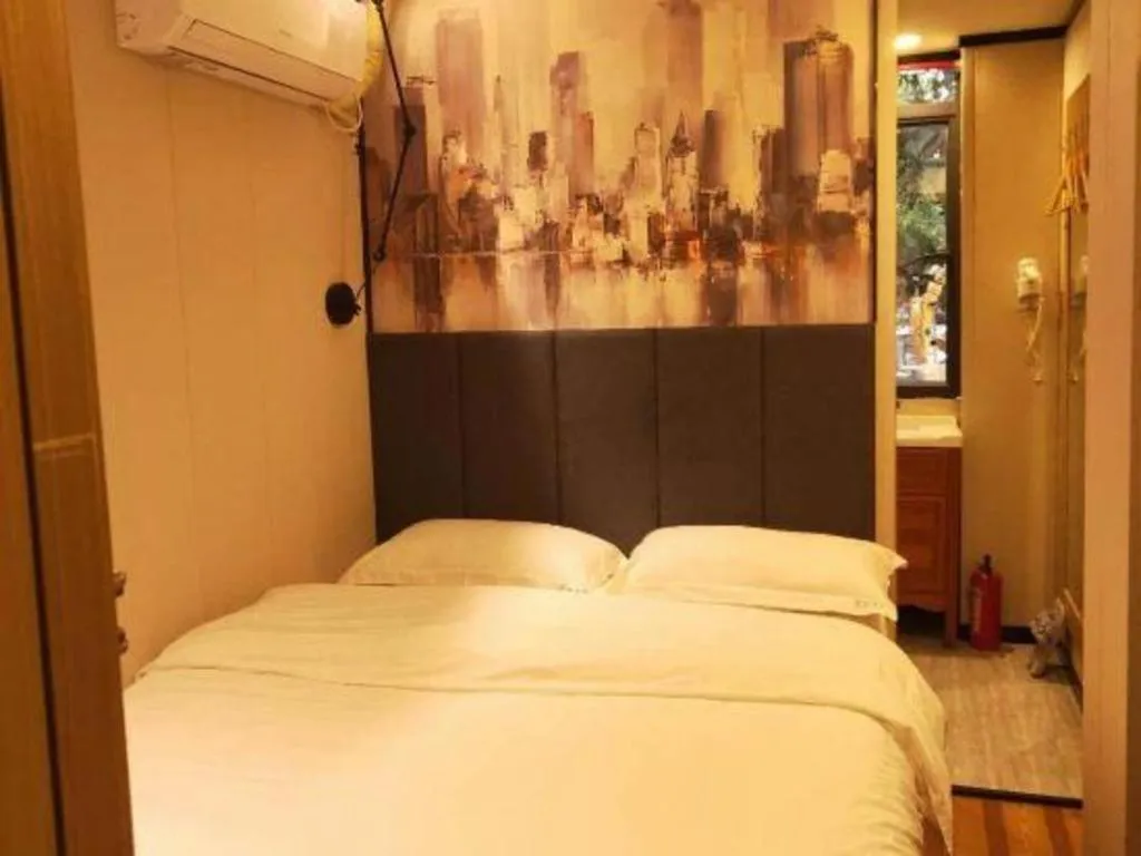 Bed in Yimi Hotel Guangzhou Sport College Branch