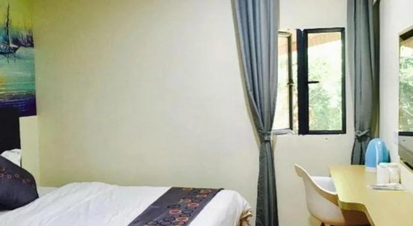 Bed in Yimi Hotel Guangzhou Sport College Branch