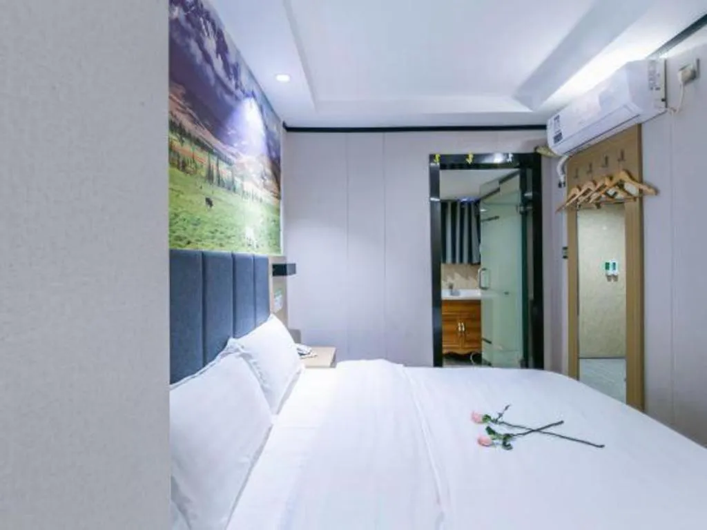 Bed in Yimi Hotel Guangzhou Sport College Branch