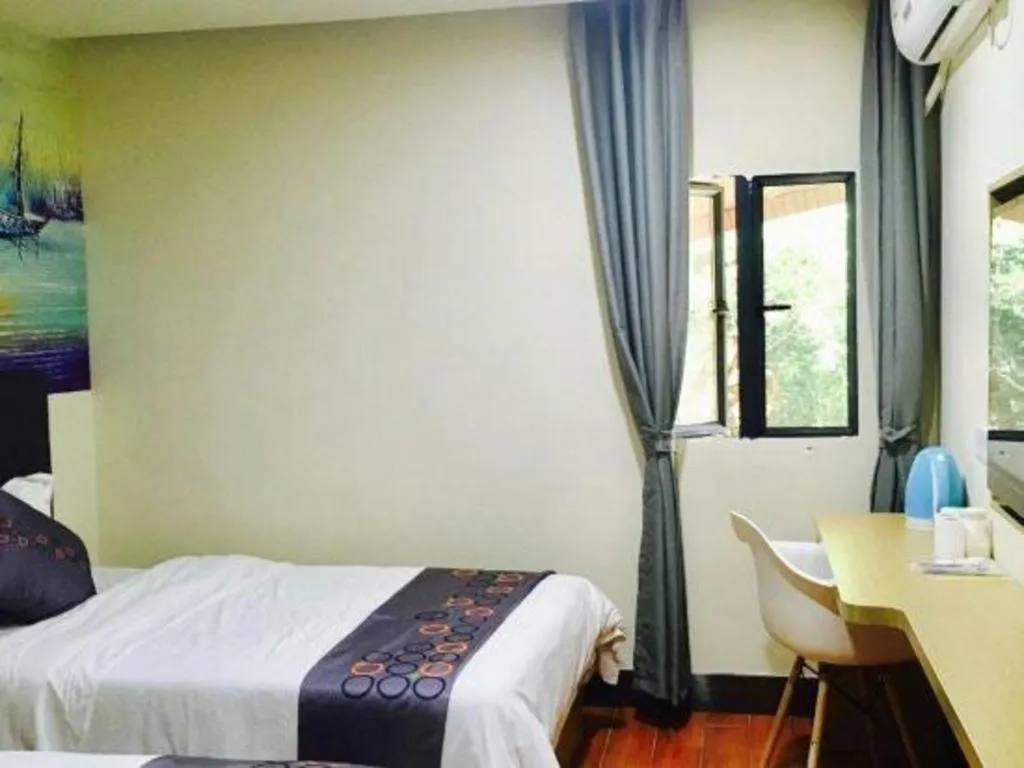 Bed in Yimi Hotel Guangzhou Sport College Branch