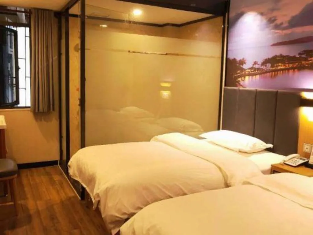 Bed in Yimi Hotel Guangzhou Sport College Branch