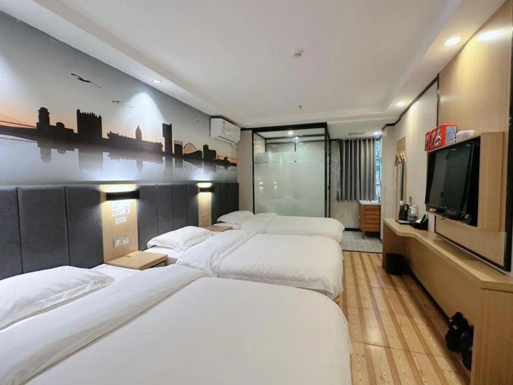Bed in Yimi Hotel Guangzhou Sport College Branch