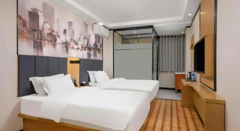 Bed in Yimi Hotel Guangzhou Sport College Branch